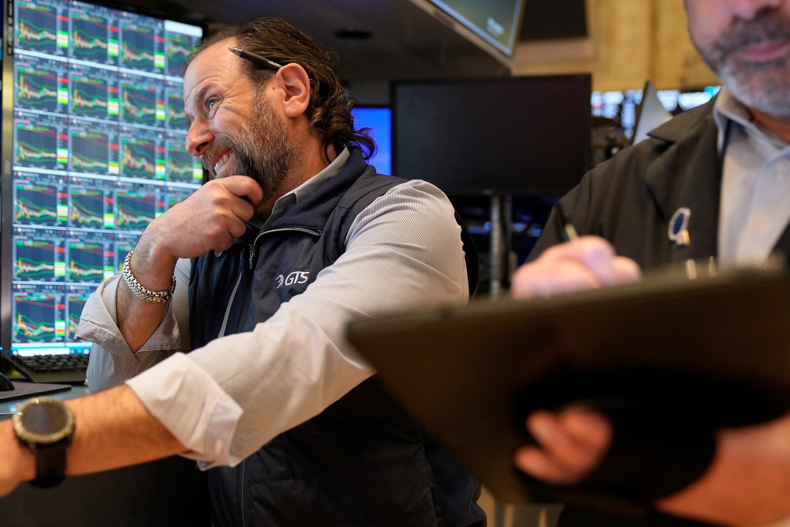 Mike Pistillo Jr. works on the floor at the New York Stock Exchange in New York, Tuesday, April 8, 2025. (AP Photo/Seth Wenig)