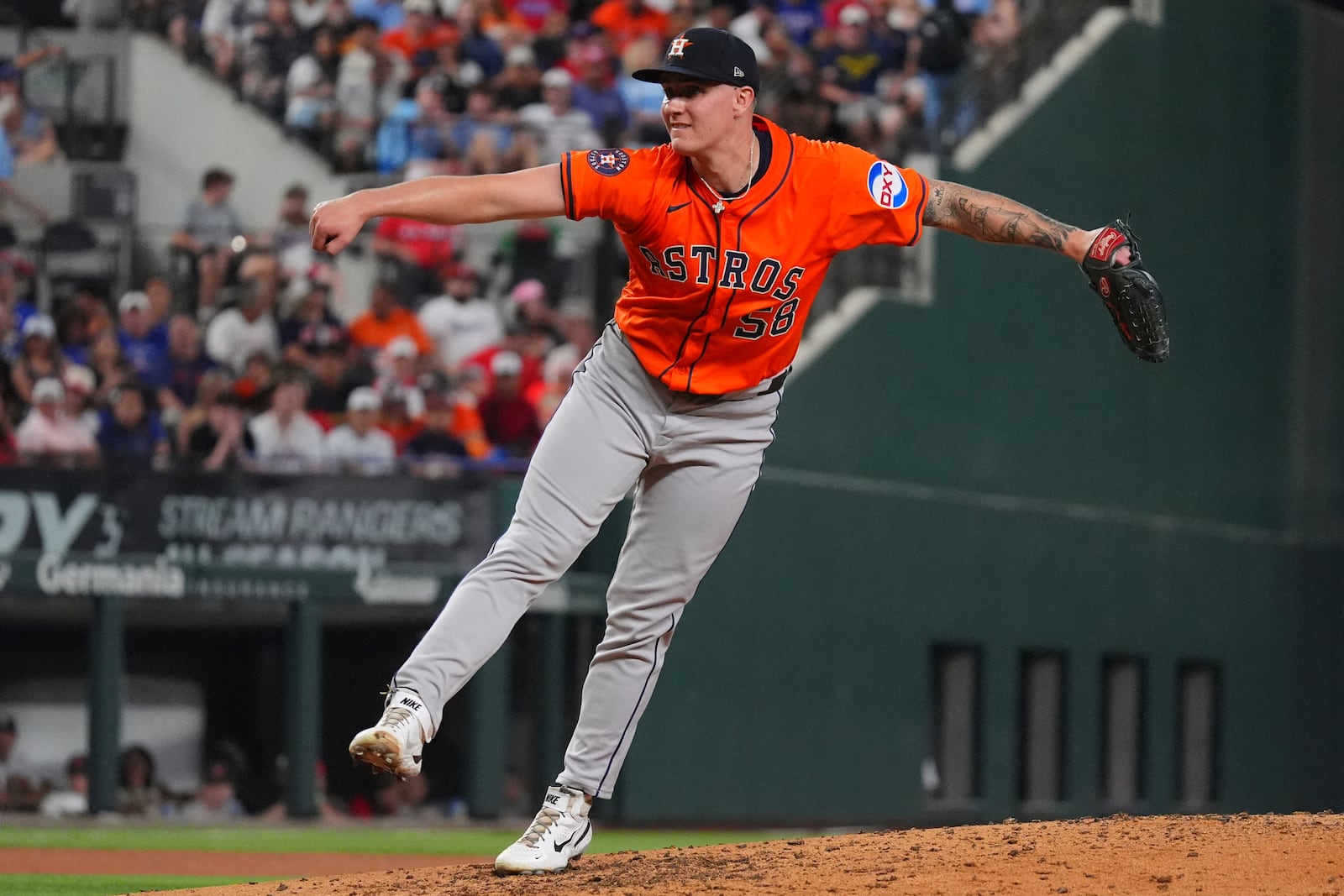 Houston Astros starting pitcher Hunter Brown throws during the fourth inning of a baseball game against the Texas Rangers, Thursday, May 15, 2025, in Arlington, Texas. (AP Photo/LM Otero)