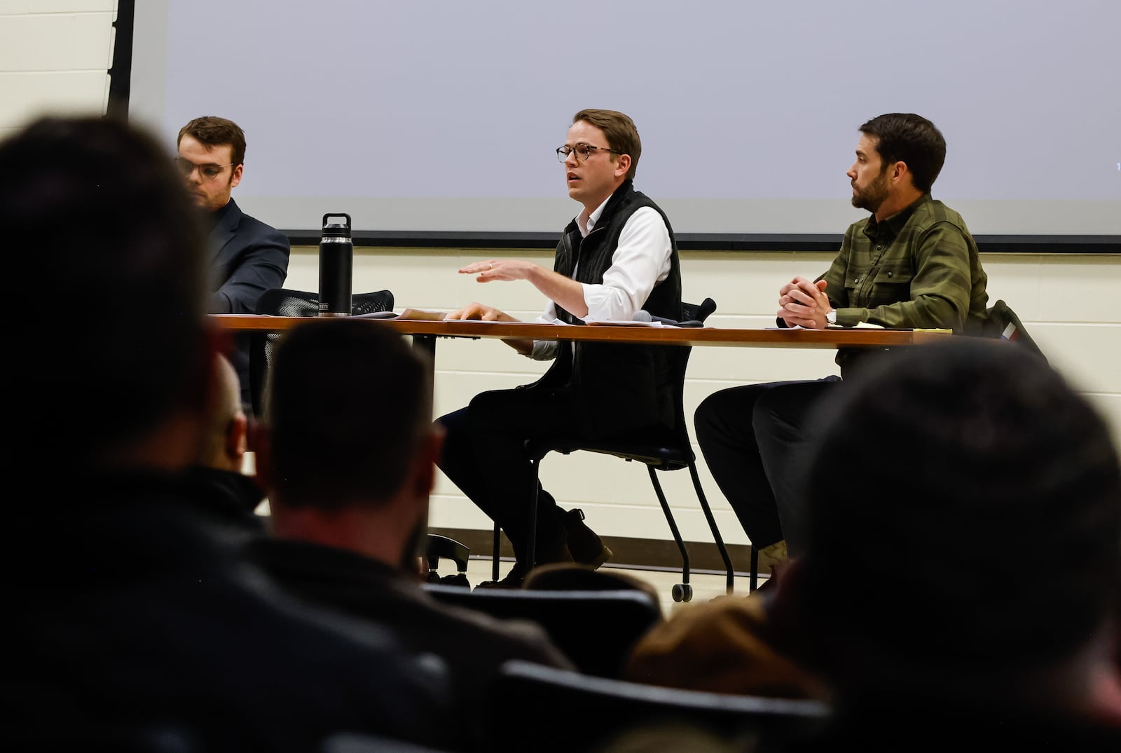 Prologis representatives JC Witt, left, and Brett Skyllingstad give information and answer questions during a forum for residents to learn more about the proposed data center project in Trenton Monday, March 2, 2026 at Edgewood High School. NICK GRAHAM/STAFF
