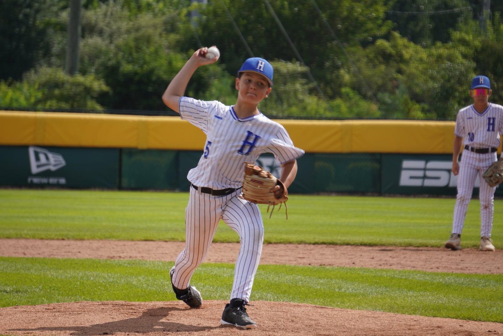 West Side Little League's Cash Jones prepares to send a pitch to the plate during his Great Lakes Region game against Kentucky on Saturday at the Little League Central Region Complex in Whitestown, Indiana. West Side won 7-0. CHRIS VOGT / CONTRIBUTED