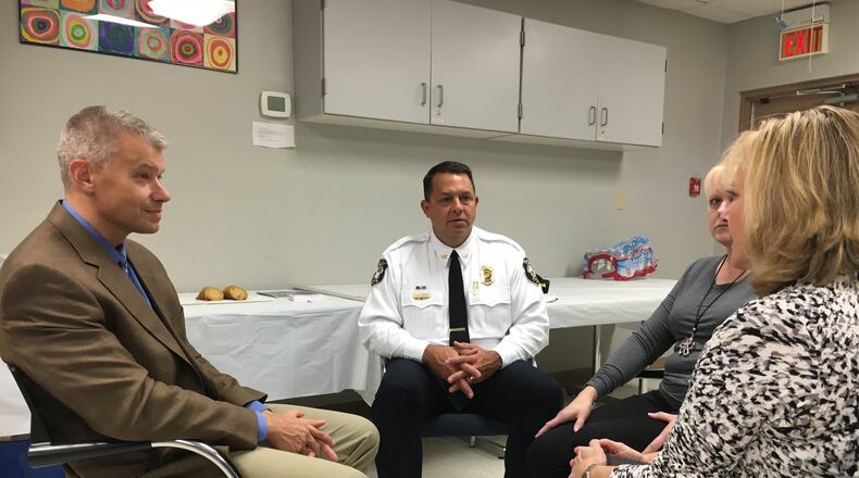 Lakota Schools Acting Superintendent Robb Voglemann (left) and West Chester Township Police Chief Joel Herzog (middle) were among those who met to discuss the new Boys & Girls Club of West Chester/Liberty coming to Olde West Chester by early 2018. MICHAEL D. CLARK/STAFF