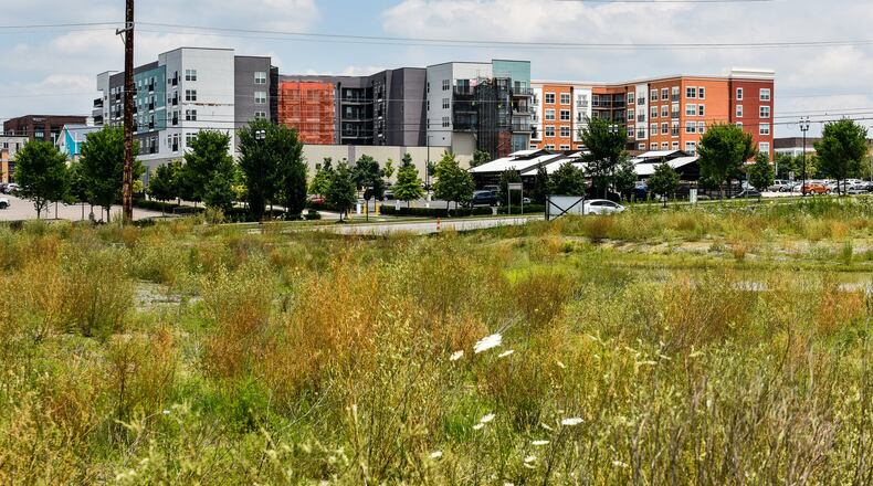 The Oaks, a long-anticipated mixed use project will launch with the construction of two retail tenants: Flying Pig Car Wash and Planet Fitness. Developed by Liberty Center developer Steiner + Associates, the Oaks is an 18-acres, mixed use community across the street from Liberty Center. When completed, it will include more than 120,000-square-feet of retail and restaurant uses, 100 luxury residential units and nearly 30,000 square feet of of class-A office space. NICK GRAHAM/STAFF