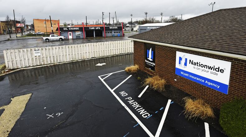 The properties at 1811 and 1835 Central Avenue, Big Al’s Muffler shop and a former Nationwide Insurance office, have sales contingent on the buyer getting all of the appropriate approvals from Middletown. The proposed O’Reilly Auto Parts store has been met with opposition from downtown Middletown business leaders. NICK GRAHAM/STAFF