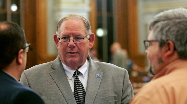 FILE - Kansas House Speaker Dan Hawkins, R-Wichita, speaks to fellow House members and staffers before a House debate April 30, 2024 at the Statehouse in Topeka, Kan. (AP Photo/John Hanna, File)