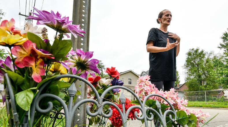 Amanda Proffitt, the Middletown woman who performed CPR on 17-year-old Joseph Davis after he was shot and killed May 29, 2018, is having a memorial for the teen and a CPR instruction event on the anniversary of the the death. Proffitt talks at the memorial at the location Davis was killed on Woodlawn Avenue. NICK GRAHAM/STAFF