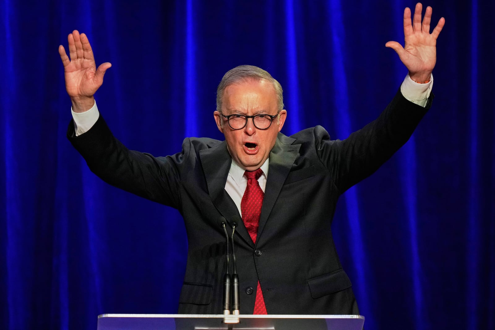 Australian Prime Minister Anthony Albanese reacts as he addresses the party faithful after winning a second term following the general election in Sydney, Saturday, May 3, 2025. (AP Photo/Rick Rycroft)