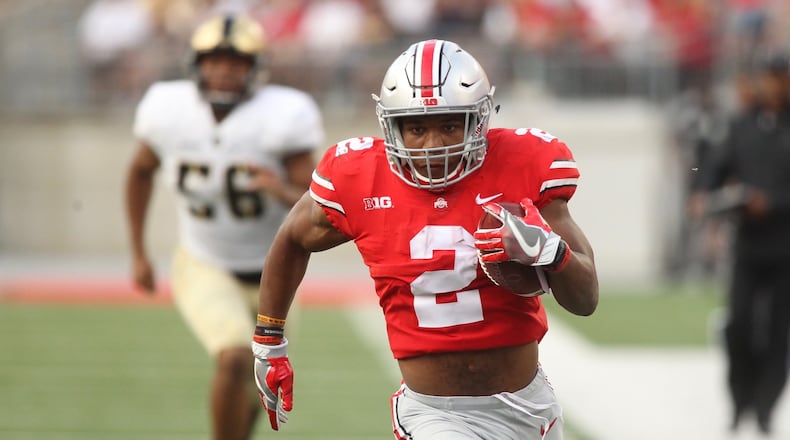 Ohio State’s J.K. Dobbins runs for a score against Army on Saturday, Sept. 16, 2017, at Ohio Stadium in Columbus. David Jablonski/Staff
