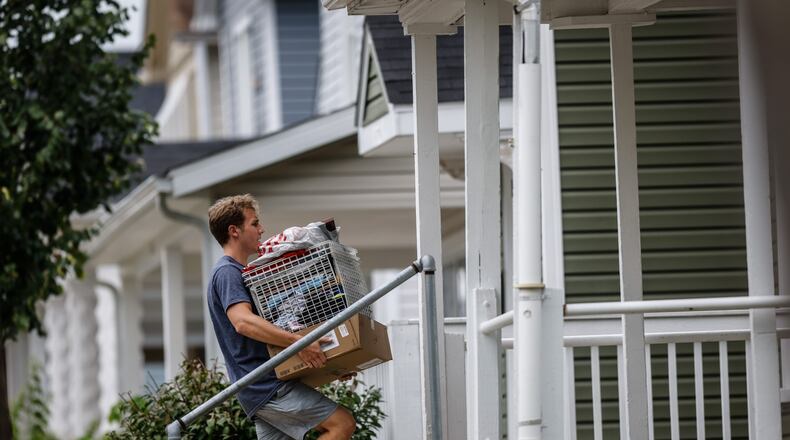 UD senior Patrick Schmidt, from Chicago, begins another year at the University of Dayton Friday August 13, 2021. Schmidt and his roommate, Alex Spoto, not pictured, are hoping for a good year at school. "70% of the campus has been vaccinated," Spoto said. "I'm ready to move on." JIM NOELKER/STAFF