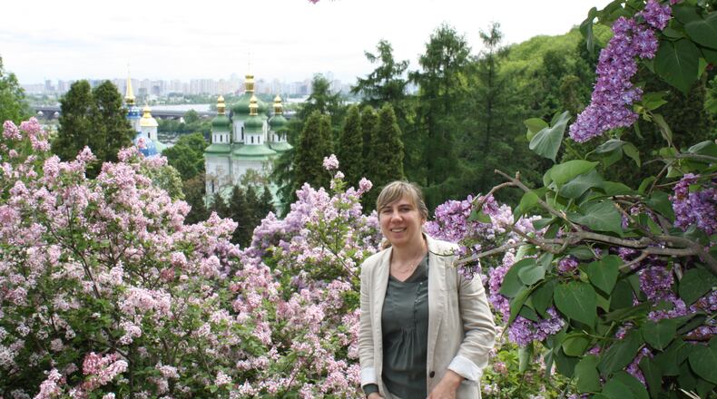 Liza Skyryzhevska, associate dean of Miami University Regionals, was born in Odessa, Ukraine, a city on the Black Sea and says this week's invasion by Russia into her homeland has her worried about family and friends scattered throughout her homeland. She is pictured here on the outskirts of Ukraine's capital city Kyiv during one of her frequent visits. (Provided Photo\Journal-News)