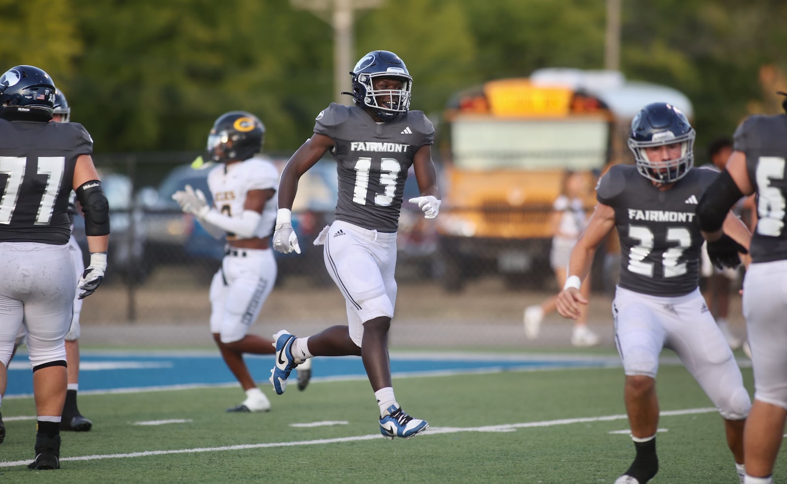Fairmont's Damien Pattin reacts after a touchdown catch against Centerville on Friday, Sept. 13, 2024, at Roush Stadium. David Jablonski/Staff