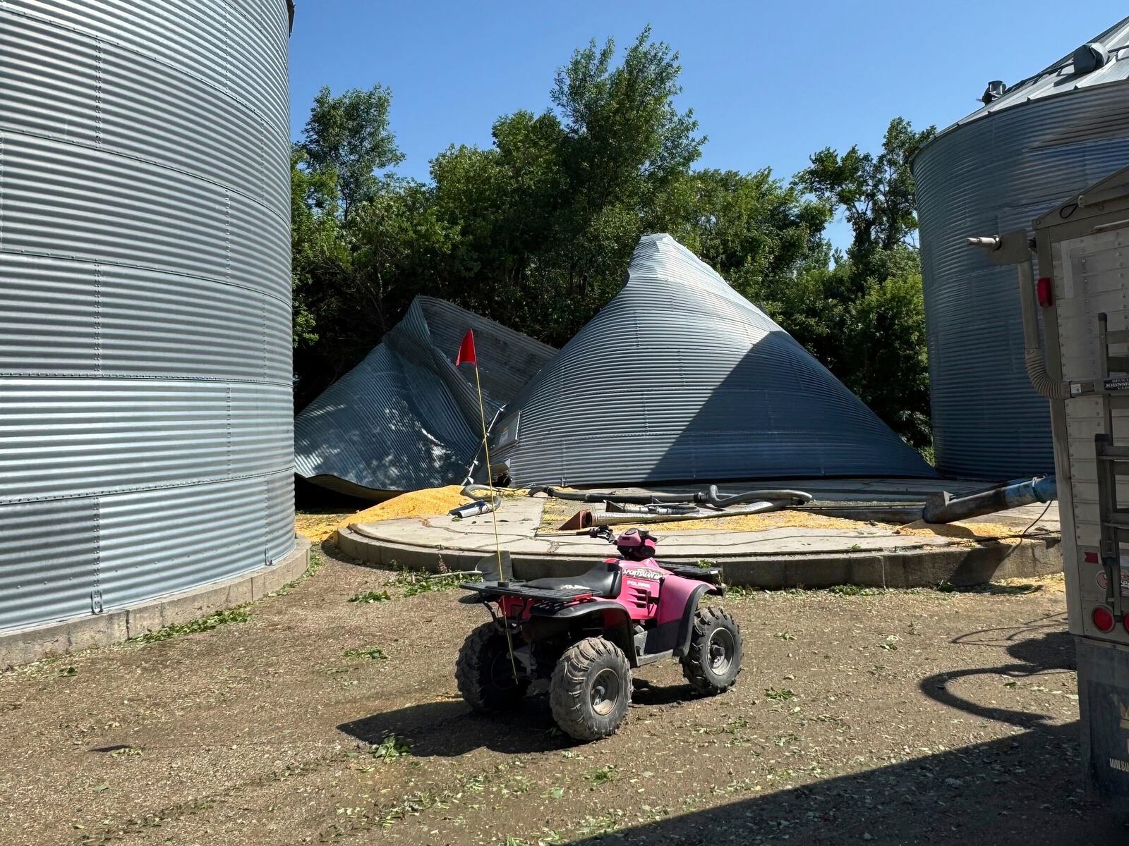 This photo taken Saturday, June 21, 2025, by Kylie Weber shows the grain bin lost in a storm at her family's farm near Oriska, N.D. (Kylie Weber via AP)