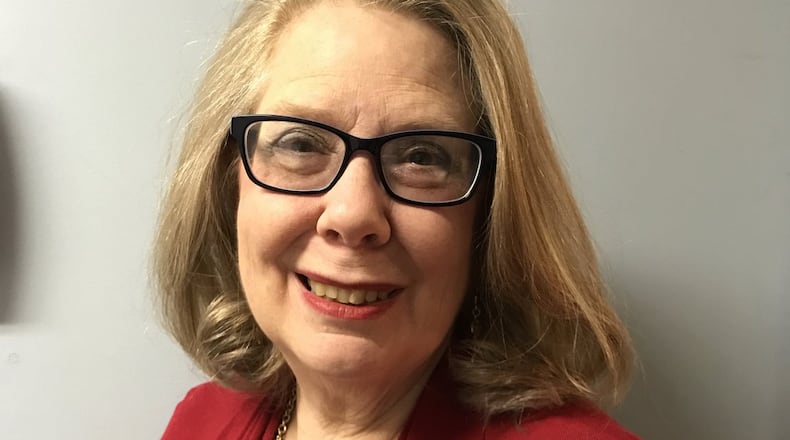 Donna Cox estimates that 20 percent of her time is spent talking to the merchants. CONTRIBUTED