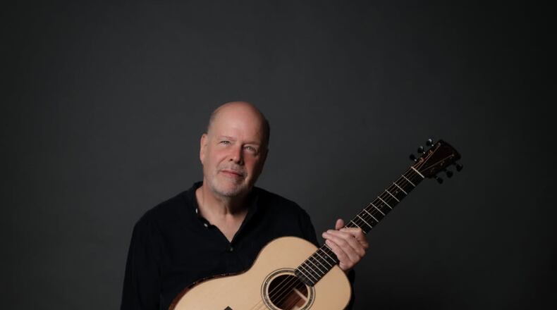 A staple of the Chicago music scene, National Fingerpicking Champion Eric Lugosch is bringing his award-winning blues, jazz, and ragtime fingerstyle guitar playing to the Dayton area for the first time. The performance is April 26 at Waynesville Music. PROVIDED PHOTO: Eric Lugosch
