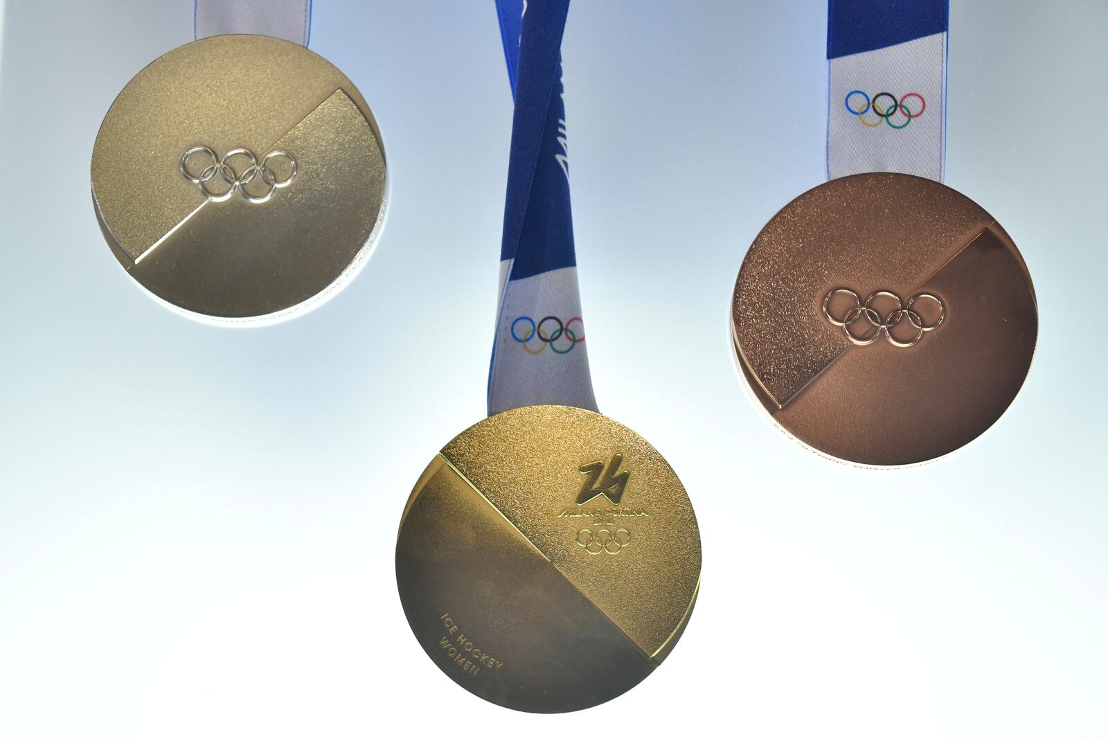 Milano Cortina 2026 Winter Olympics medals are displayed during the unveiling ceremony in Venice, Italy, Tuesday, July 15, 2025. (AP Photo/Luigi Costantini)