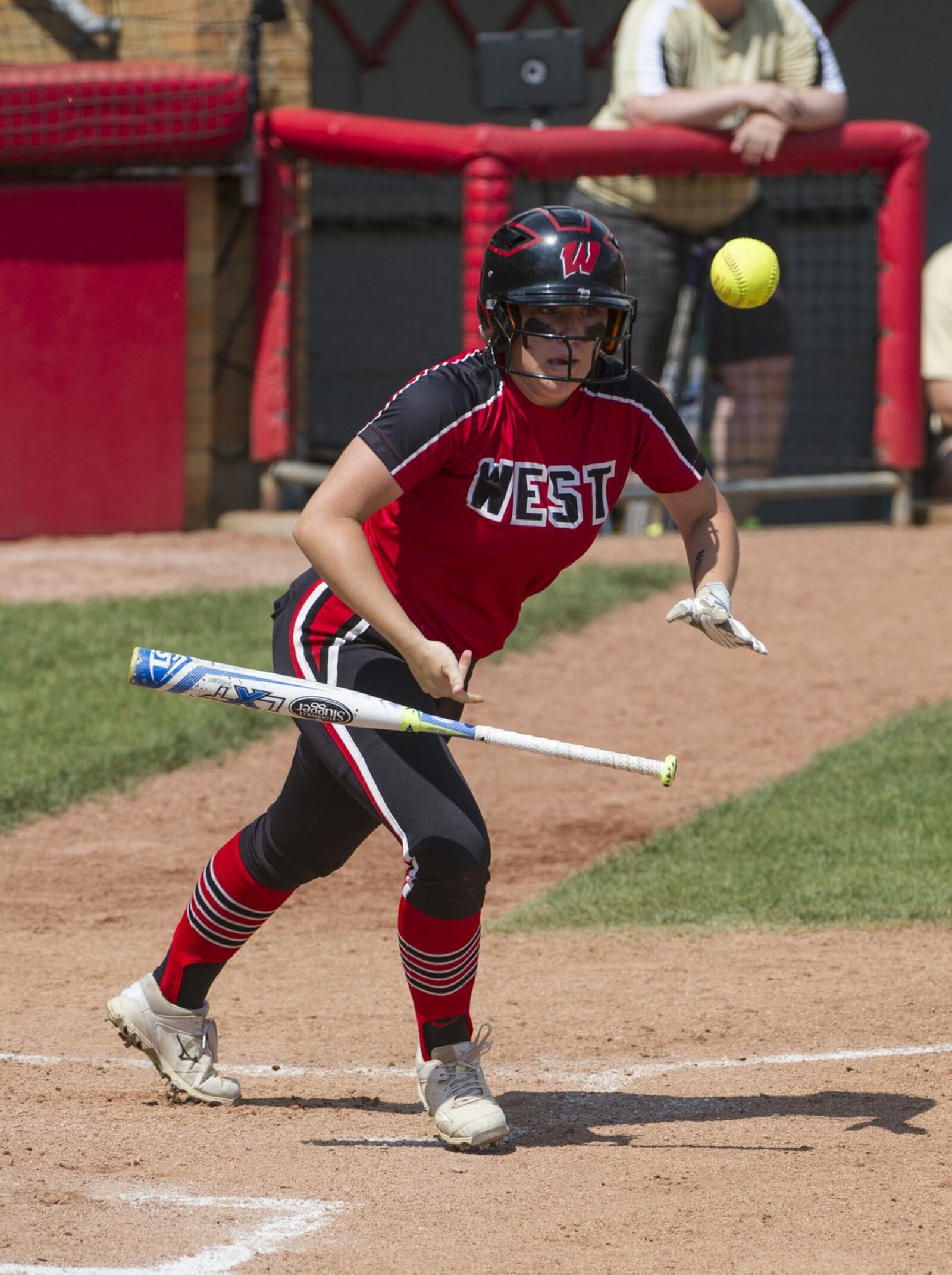 Lakota West’s Corey Weaver bunts in the second inning of Thursday’s 2-1, eight-inning win over Perrysburg in a Division I state semifinal at Firestone Stadium in Akron. PHIL LONG/OHIO PRESS PHOTO SYSTEM