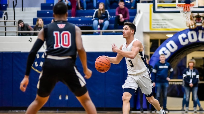 Edgewood’s Anthony Scott dribbles up the court during their basketball game against Mt. Healthy. Edgewood falls to Mt. Healthy 66-41 Friday, Feb. 14, 2020 at Edgewood High School. NICK GRAHAM / STAFF