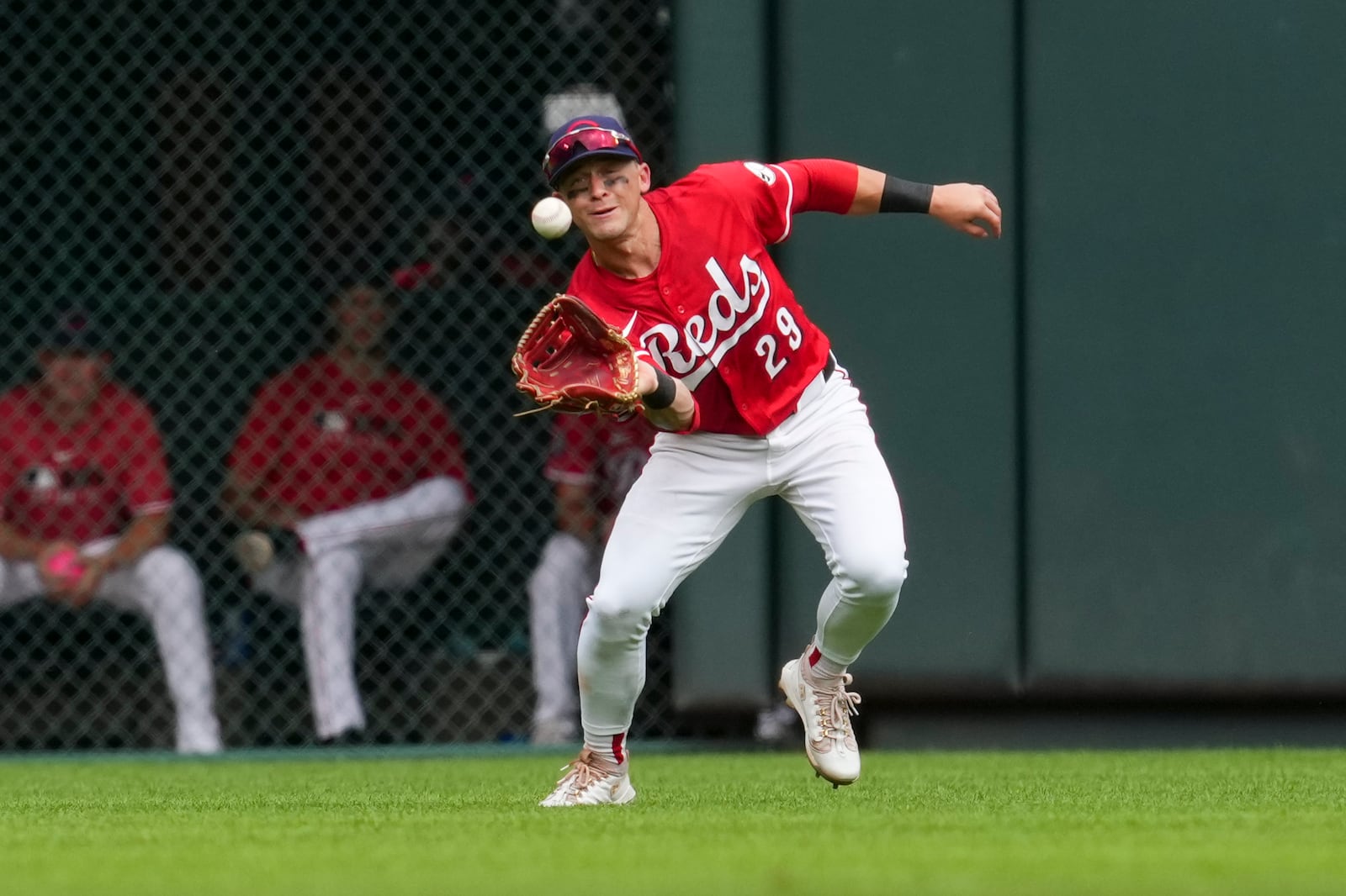 Cincinnati Reds outfielder TJ Friedl catches a line drive hit by Tampa Bay Rays' Chandler Simpson during the seventh inning of a baseball game, Sunday, July 27, 2025, in Cincinnati. (AP Photo/Jeff Dean)