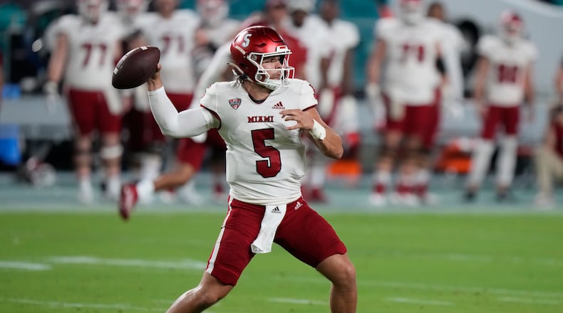 Miami (Ohio) quarterback Brett Gabbert throws a pass during the first half of an NCAA college football game against Miami, Friday, Sept. 1, 2023. Gabbert passed for two touchdowns and rushed for a pair of scores on Saturday vs. Western Michigan. (AP Photo/Wilfredo Lee)