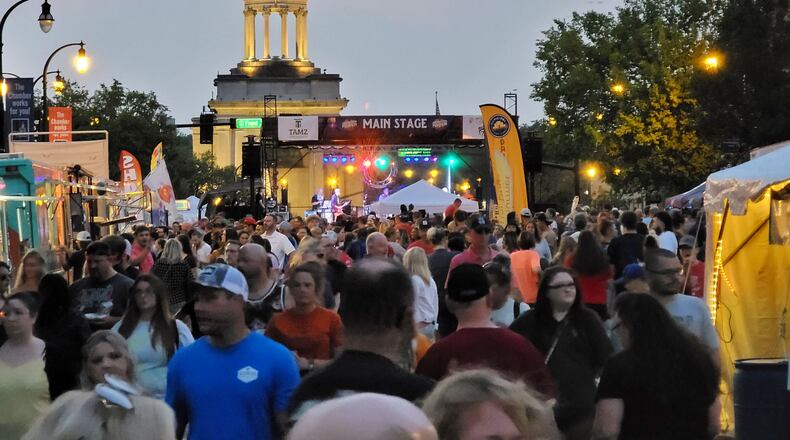 High Street was closed and lined with vendors, food trucks, rides, games, pumpkins and more for visitors to enjoy Saturday at the 10th annual Operation Pumpkin in downtown Hamilton. NICK GRAHAM / STAFF