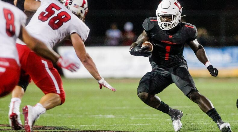 Lakota West’s David Afari carries the football during their football game against Fairfield Friday, Sept. 27, 2019 at Lakota West High School in West Chester Township. Fairfield defeated Lakota West 33-7. NICK GRAHAM/STAFF