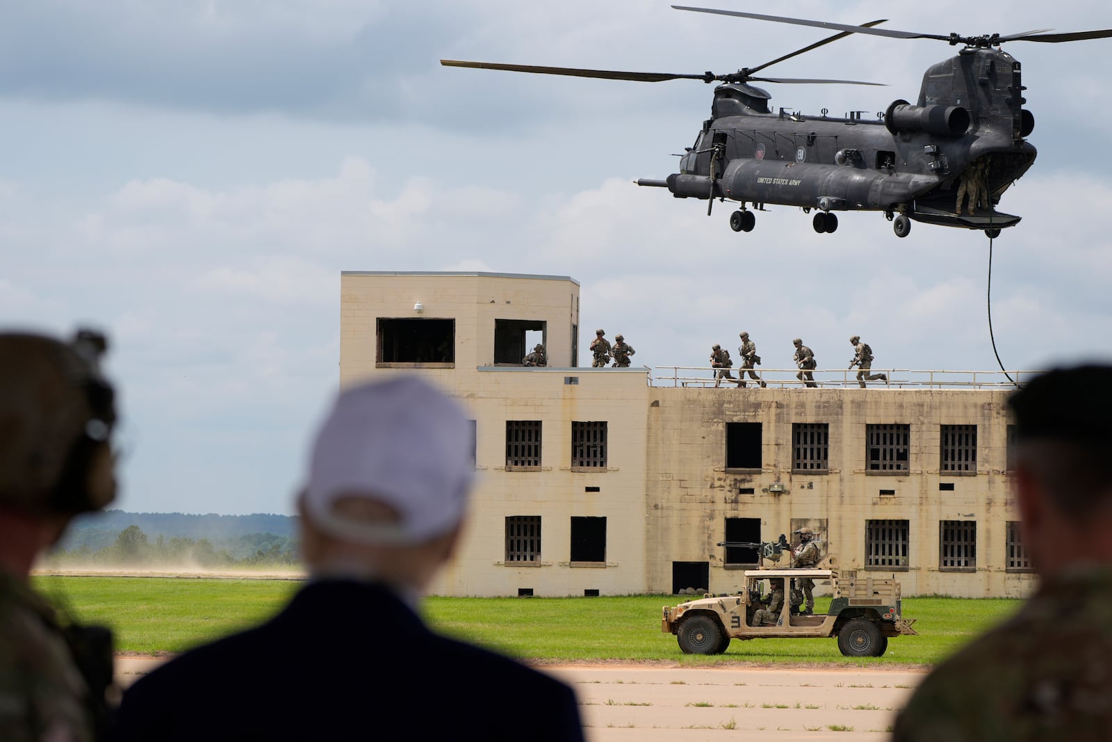 President Donald Trump observes a special operations command demonstration at Fort Bragg, Tuesday, June 10, 2025, in Fort Bragg, N.C. (AP Photo/Alex Brandon)