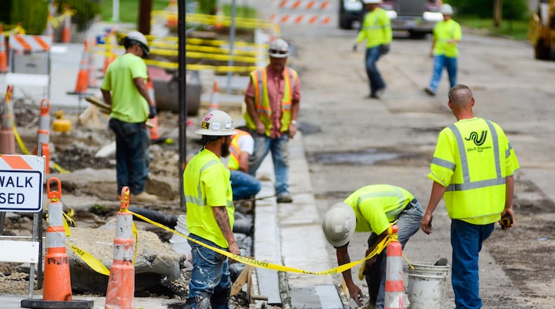 Several Butler County road projects will be delayed and some street repaving may be cancelled after the county received bids too high for its budget. MICHAEL D. PITMAN / STAFF