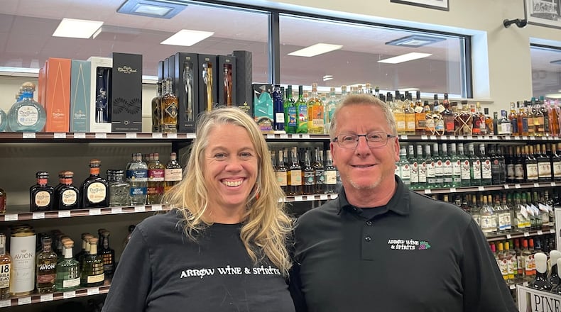 Pictured is Beth Freyvogel and Mif Frank, third-generation owners of Arrow Wine & Spirits. NATALIE JONES/STAFF