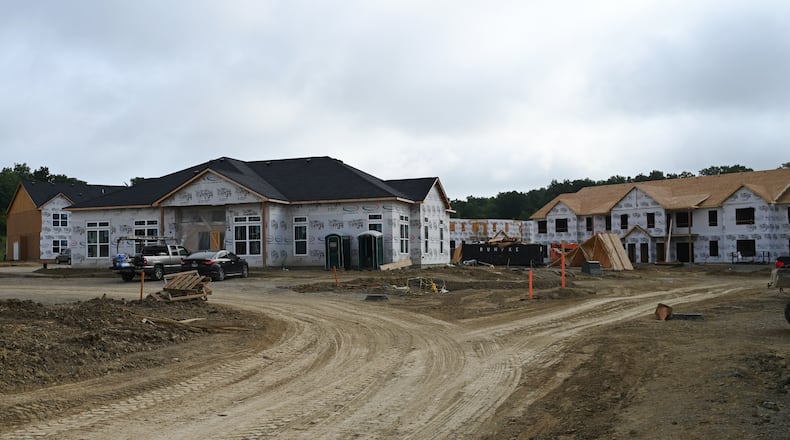 The Remington Lake development in Hamilton is a few months away from seeing some people move in. When they are open, it will have 22 buildings for 272 apartments behind Meijer on the city's west side. Pictured are some of the buildings under construction on Monday, July 29, 2024. MICHAEL D. PITMAN/STAFF