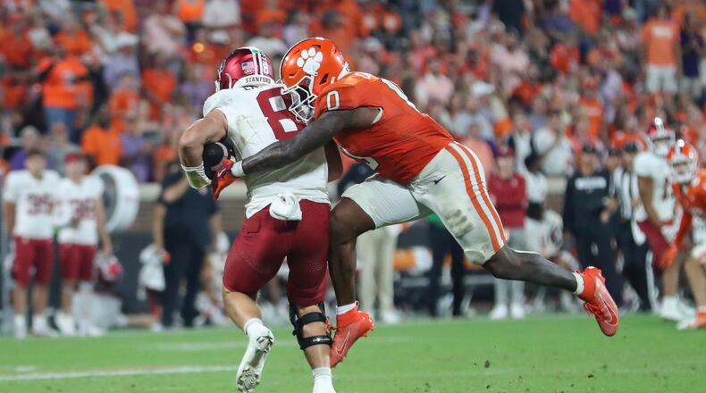 Clemson linebacker Barrett Carter (0) sacks Stanford quarterback Justin Lamson (8) during the second half of an NCAA college football game Saturday, Sept. 28, 2024, in Clemson, S.C. (AP Photo/Artie Walker Jr.)