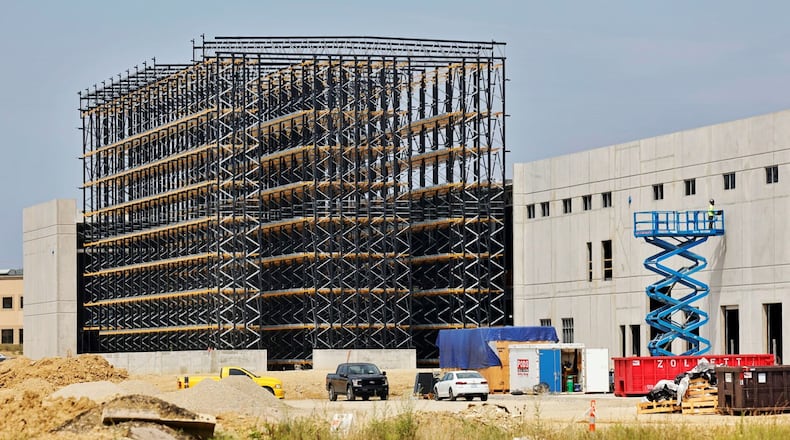 Saica Group President Ramón Alejandro told the Journal-News his company plans an aggressive $800 million expansion in the United States over the next five years years, with plans to add other manufacturing plants and a paper mill in the Midwest. Pictured is construction work on the Sacia plant in Hamilton. NICK GRAHAM/STAFF