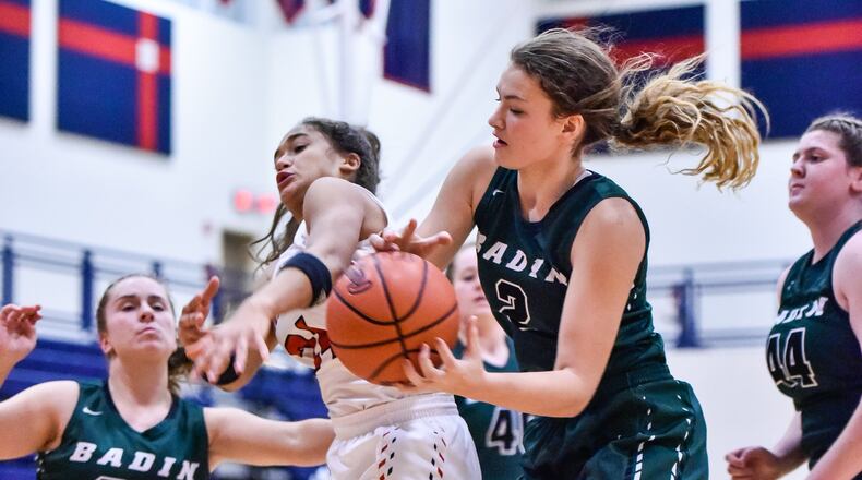 Badin’s Shelby Nusbaum (2) wins the battle for the ball with Talawanda’s Jazz Bennett during Wednesday night’s game in Oxford. Also on the play for the Rams are Macy Harper (35) and Claire McCurley (44). NICK GRAHAM/STAFF