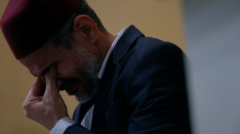 Ayman Soliman leads a prayer service at the mosque in Clifton. Soliman was detained for more than 70 days this summer after his asylum status was revoked. He says he's sharing his story now because of the immigrants he met in jail. KEITH BIERYGOLICK/WCPO