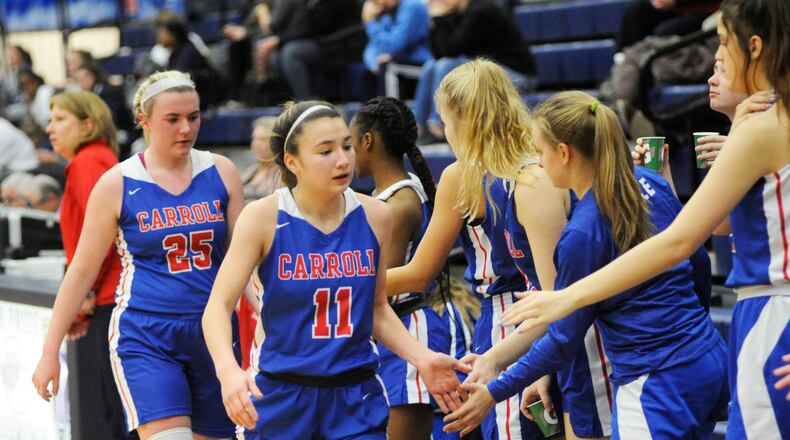 Carroll sophomores Ava Lickliter (11) and Megan Leraas (25) helped the Patriots tie Poland Seminary as the Division II girls basketball state poll champs. MARC PENDLETON / STAFF