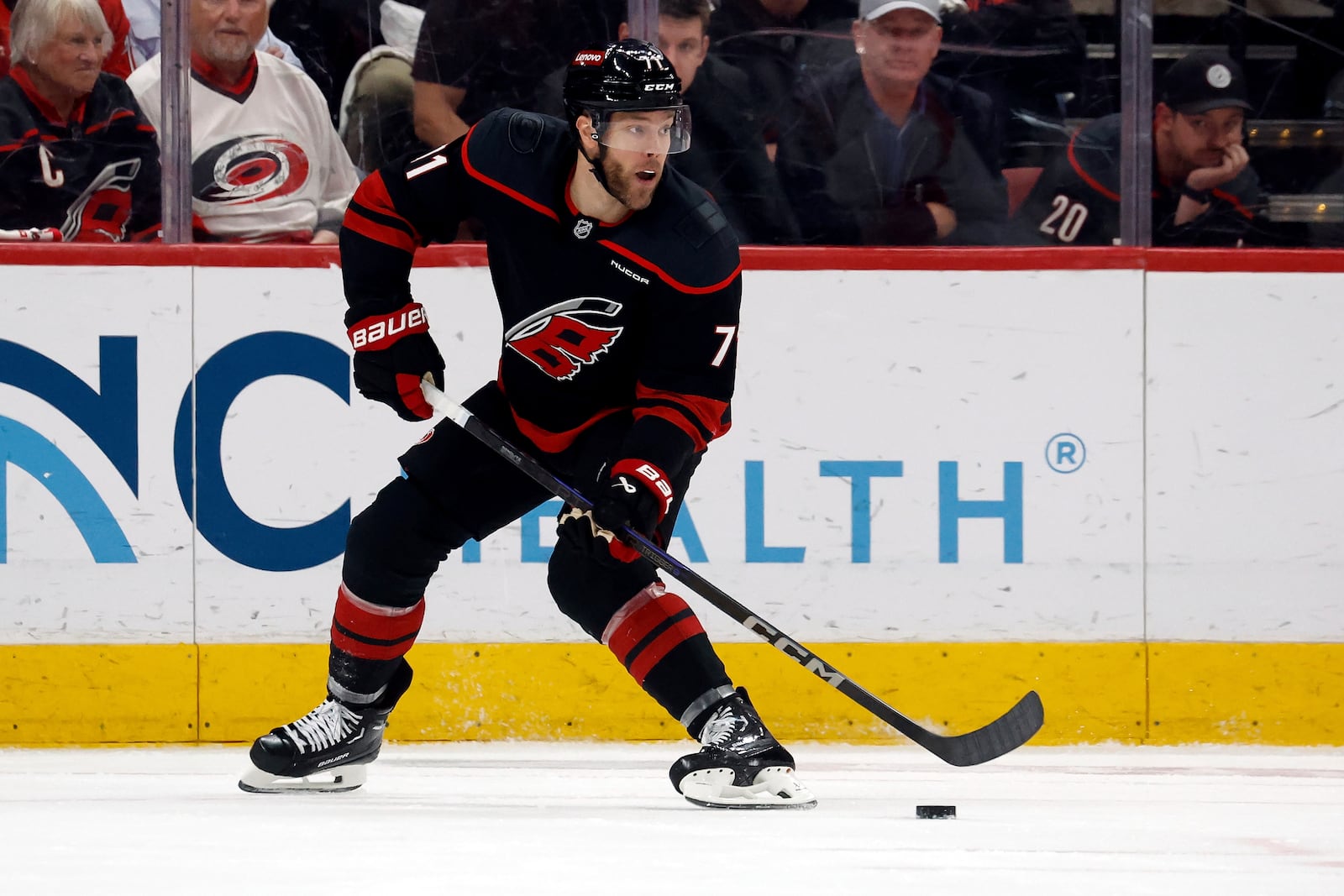 Carolina Hurricanes' Taylor Hall (71) controls the puck against the Florida Panthers during the second period of Game 1 of the NHL hockey Stanley Cup Eastern Conference finals in Raleigh, N.C., Tuesday, May 20, 2025. (AP Photo/Karl DeBlaker)