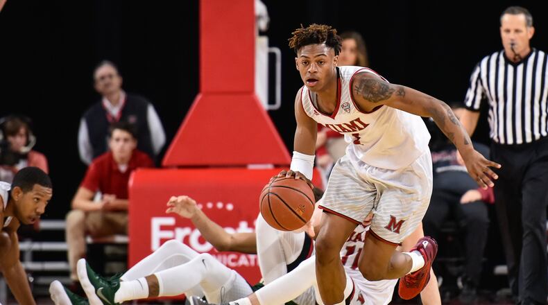 Miami’s Nike Sibande dribbles the ball on a fast break during their game Tuesday, Nov. 14, 2017, at Millett Hall on the Miami University Campus in Oxford. . NICK GRAHAM/STAFF