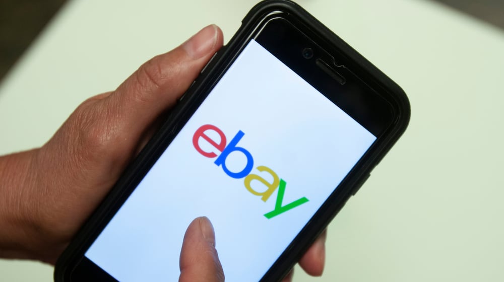 FILE - An Ebay app logo is shown on a mobile phone, July 11, 2019, in Miami. (AP Photo/Wilfredo Lee, File)