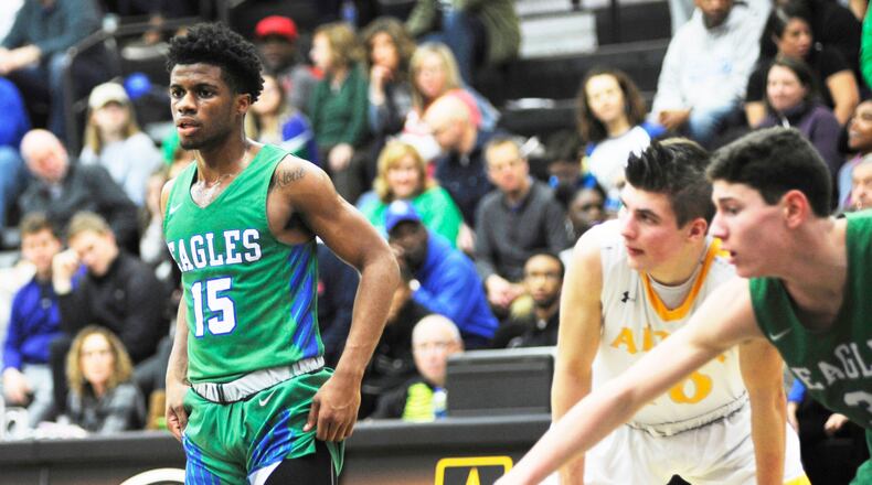 CJ senior Milton Gage (left) is a four-year starter and leads the Eagles in scoring (17.9). MARC PENDLETON / STAFF