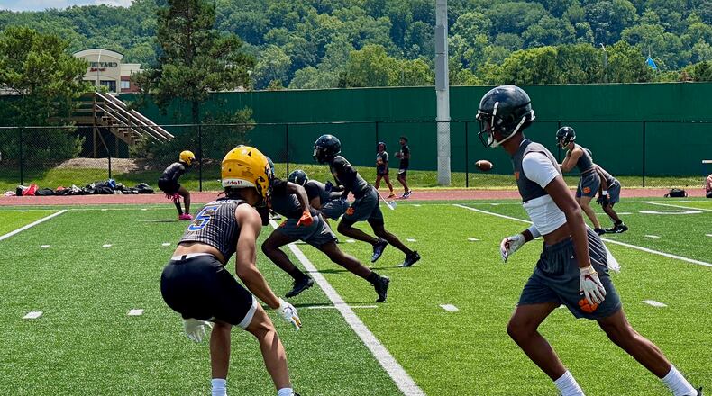 Springfield CB Aaron Scott Jr. (left) and Chris Henry Jr. of Withrow faced off Tuesday at the 2023 Social Justice 7 on 7 at the University of Dayton (Marcus Hartman/STAFF)