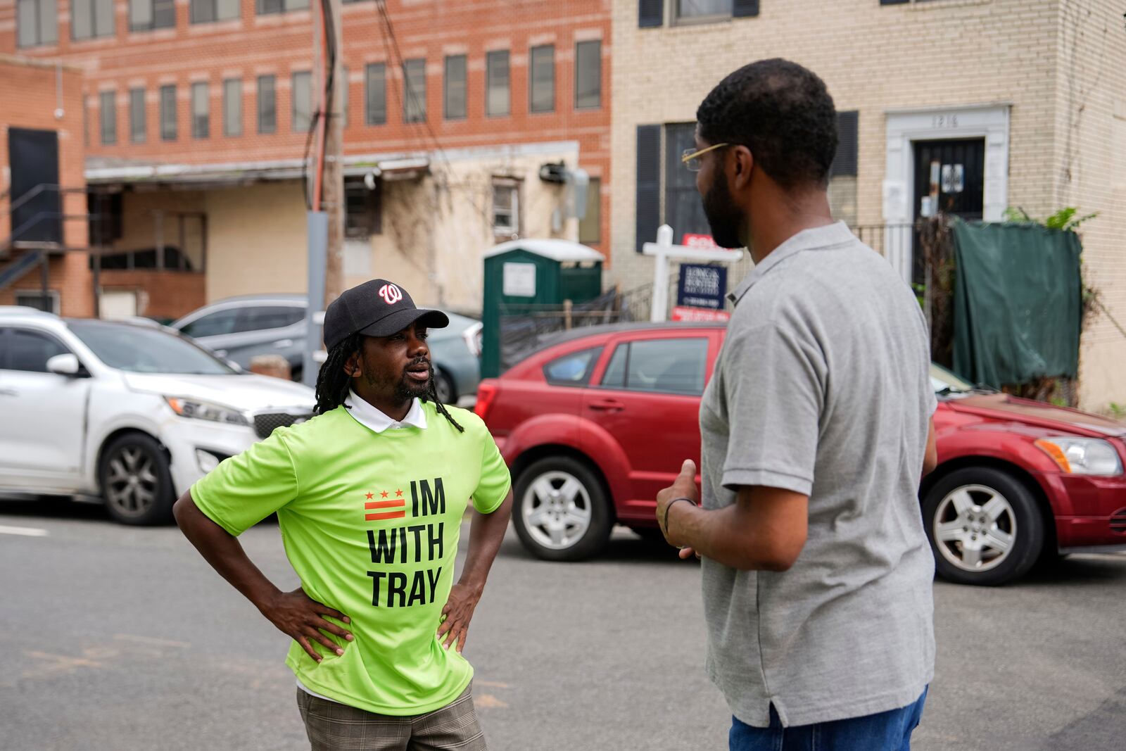 Former District of Columbia Councilman Trayon White talks to a voter outside Union Temple Baptist Church during the Ward 8 special election, Tuesday, July 15, 2025, in Washington. (AP Photo/Julia Demaree Nikhinson)