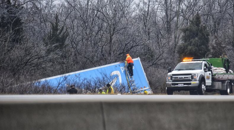 A crash involving a semi truck on its side caused a large backup on Interstate 75 in Butler County on Monday, Jan. 25, 2021. The crash happened just north of the rest stop near Monroe. NICK GRAHAM / STAFF