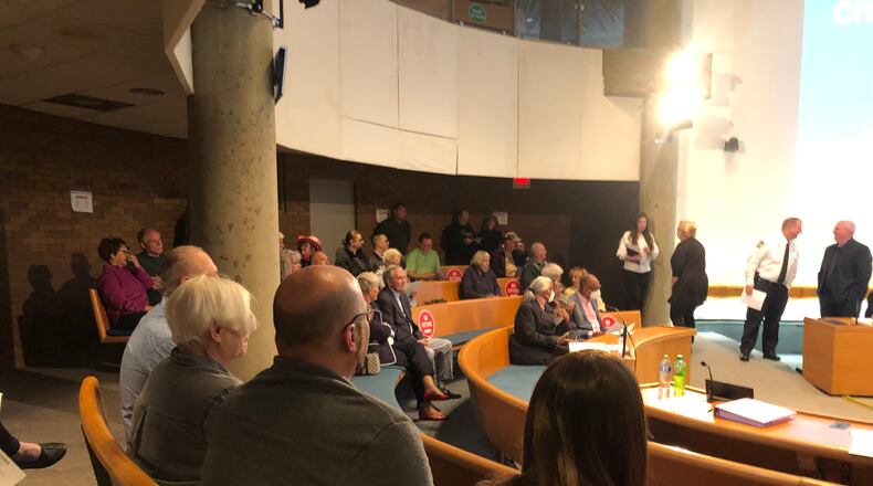 A large crowd attended Tuesday's Middletown City Council meeting where a public hearing was heard regarding a proposed housing development on land formerly owned by Middletown Regional Hospital. RICK McCRABB/STAFF