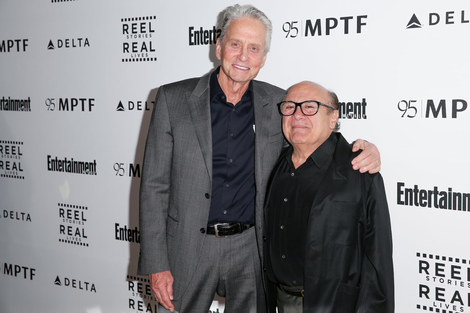 FILE - Michael Douglas, left, and Danny DeVito appear at the 5th Annual Reel Stories, Real Lives Benefit on April 7, 2016, in Los Angeles. (Photo by Rich Fury/Invision/AP, File)