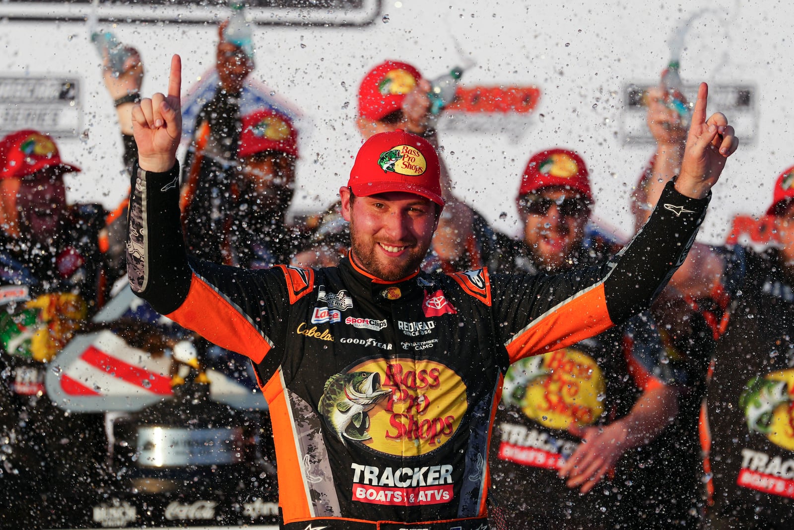 Chase Briscoe celebrates in Victory Lane after winning a NASCAR Cup Series auto race at Pocono Raceway, Sunday, June 22, 2025, in Long Pond, Pa. (AP Photo/Derik Hamilton)