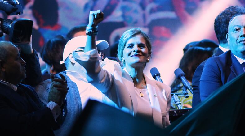 Presidential candidate Laura Fernández addresses supporters after polls closed in San Jose, Costa Rica, Sunday, Feb. 1, 2026. (AP Photo/Carlos Borbon)