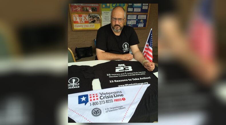 Air Force veteran Tom Pergola of Akron raised awarness about veteran suicides in a 2014 event. (Cheryl Powell/Akron Beacon Journal)