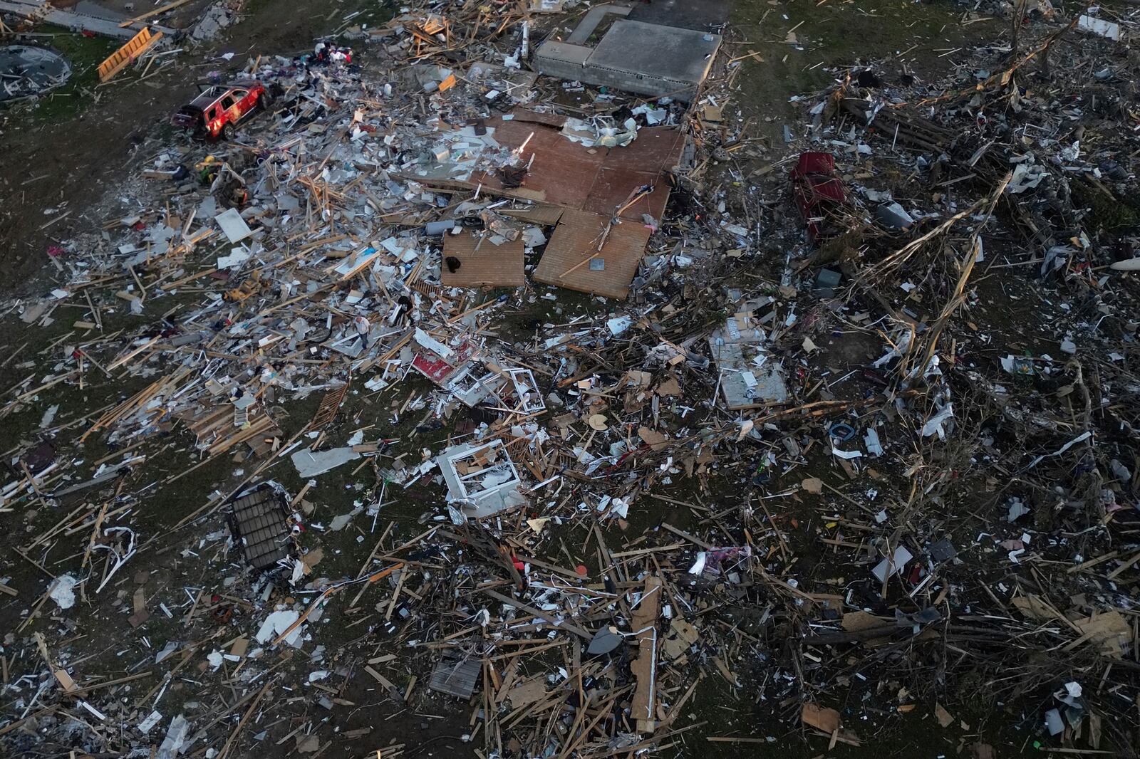 A home is destroyed after a severe storm passed through the area, Saturday, May 17, 2025, in London, Ky. (AP Photo/Carolyn Kaster)