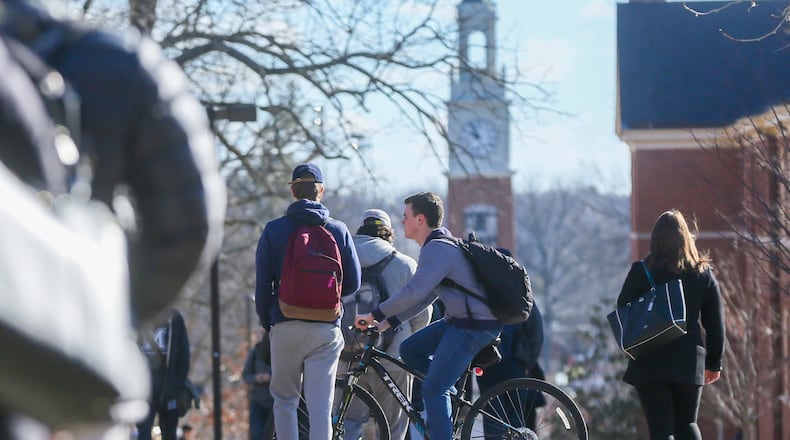 Students walk through the campus of Miami University in Oxford on Feb. 15. Ohio State University and Miami University, which is Butler County’s largest employer, added more students between spring 2016 and spring 2017 than any other state institutions. GREG LYNCH / STAFF