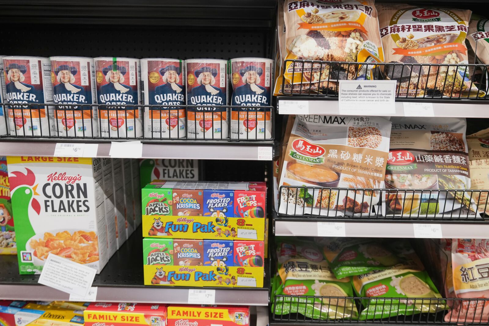 US brand cereals, left, sit next next to imported cereals from Taiwan in an aisle at 99 Ranch Market, an Asian grocery store in Los Angeles Monday, April 7, 2025. (AP Photo/Damian Dovarganes)
