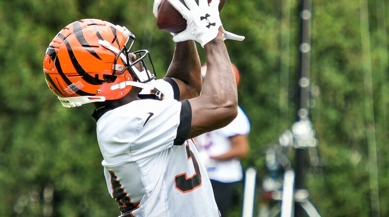 Bengals’ rookie running back Quinton Flowers catches a pass during organized team activities Tuesday, May 22 at the practice facility near Paul Brown Stadium in Cincinnati. NICK GRAHAM/STAFF