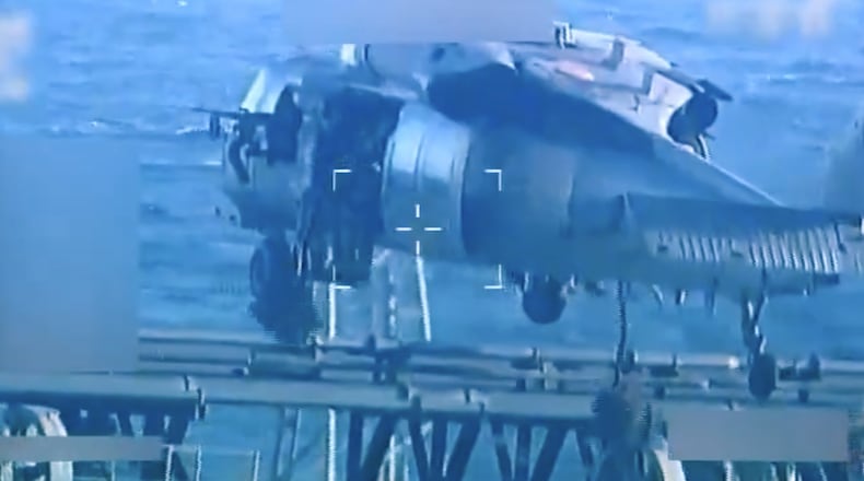 This image from video posted on Attorney General Pam Bondi's X account, and partially redacted by the source, shows an oil tanker being seized by U.S. forces off the coast of Venezuela, Wednesday, Dec. 10, 2025. (U.S. Attorney General's Office/X via AP)